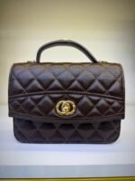 Elegant Dark Brown Quilted Grain Leather Top-Handle Handbag with Gold Interlocking Clasp
